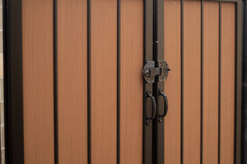 wooden double doors with lock