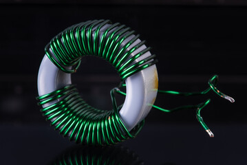 Electromagnetic Component Copper Inductor on Dark Background