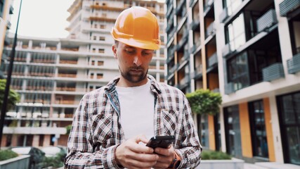 Inclusion of mobile applications in the development management process. Caucasian engineer builder...