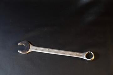 wrench on a black