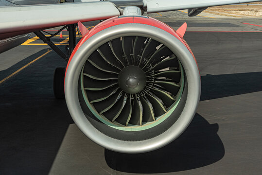 Red jet engine
Close-up of aircraft turbine
