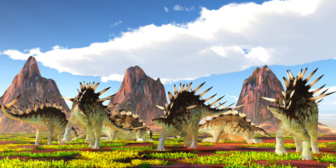 Kentrosaurus Herd - A herd of Kentrosaurus herbivorous dinosaurs feed and rest under nearby mountains during the Jurassic Period of Tanzania. © Catmando