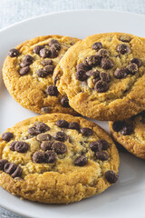 Homemade cookies with chocolate on white plane