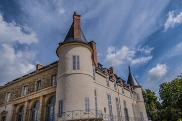 Fragments of Chateau de Rambouillet (Castle of Rambouillet, XIV century) in picturesque Public Park in town of Rambouillet. Yvelines department, Ile-de-France region, 50 km southwest of Paris. France.