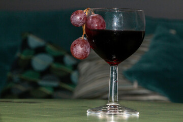 Delicious grapes in a wine glass
