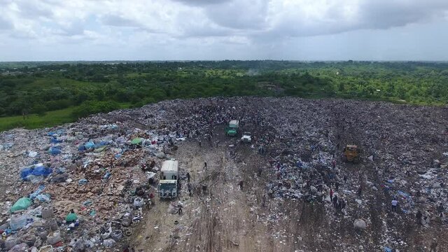 People working at Duquesa landfill, Santo Domingo. Aerial forward