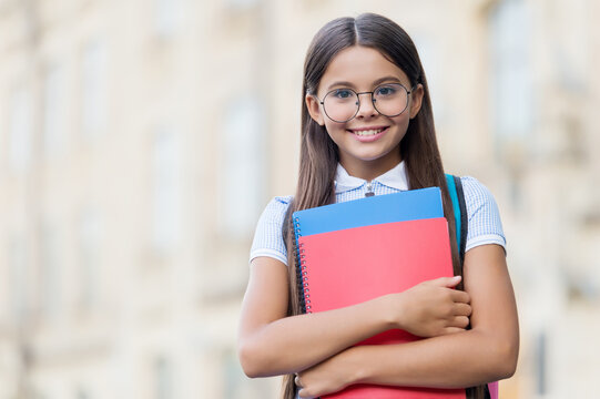 Happy Small Kid Smile In Eyeglasses Holding School Books Outdoors, Knowledge, Copy Space