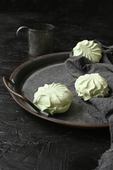 Background of many green russian marshmallows zephyr