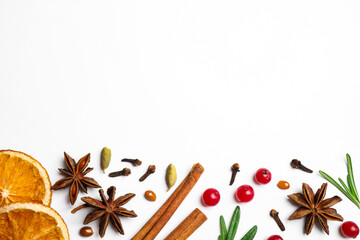 Different mulled wine ingredients on white background, flat lay. Space for text