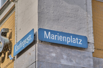 Street signs on the corner of square Marienplatz (Mary's Square) and street Kaufingerstrasse in Munich, Germany