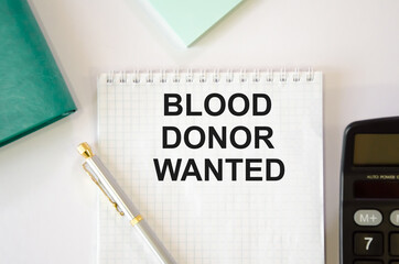  BLOOD DONOR WANTED. medical concept. the phrase is written on a notepad. strategy, plan, planning.