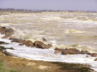Fototapeta na wymiar Storm at sea on a sunny day
