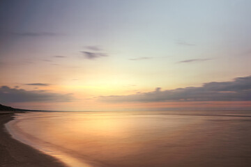 Fototapeta na wymiar beautiful seascape at sunset, golden hour, long exposure