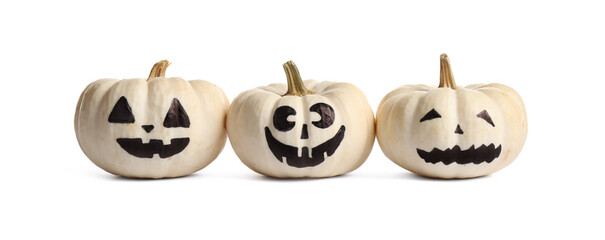 Halloween pumpkins with cute drawn faces on white background