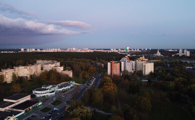 Top view of the outskirts of the city at sunset