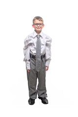 Small child dressed in a business suit and glasses as a businessman. Child in his fathers suit isolated on white background