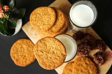 cup of milk with cookies