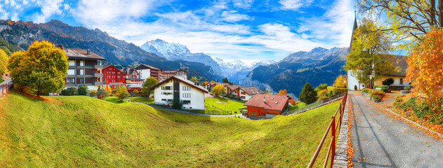 Astonishing autumn view of picturesque alpine village Wengen.