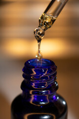 Product close up. Skincare - Facial Oil/Serum - Dropper shot. Motion shot.