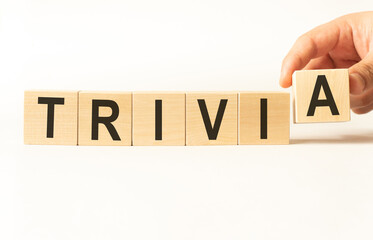 Word trivia. Wooden small cubes with letters isolated on white background with copy space available.Business Concept image.