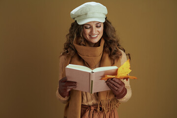 happy modern woman in scarf isolated on bronze background