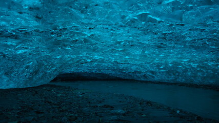 A glacier river that forms the cave in the Hansbreen Glacier. 
Norway, Svalbard, Hornsund.