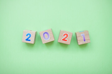 Happy New year 2021 celebration. The inscription 2021 from children's educational wooden cubes