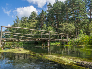 Fototapeta premium Wooden bridge on the river