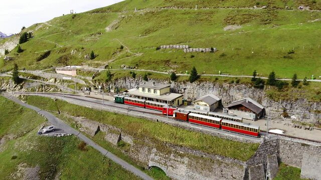 Famous cog railway on the mountain Schynige Platte in Switzerland - a popular tourist attraction