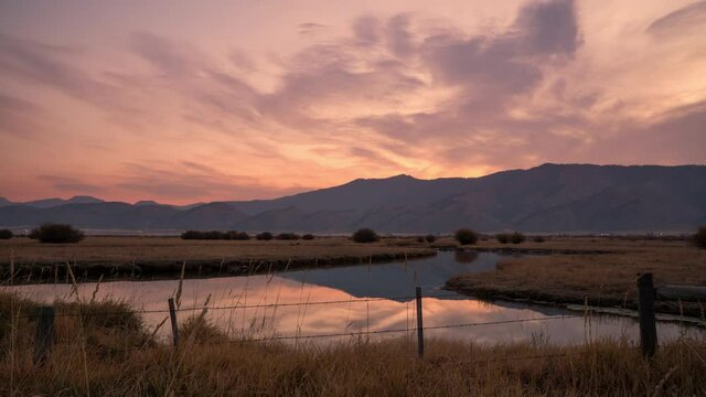 Sunrise over the Salt River in Wyoming at dawn as the sky lights up.