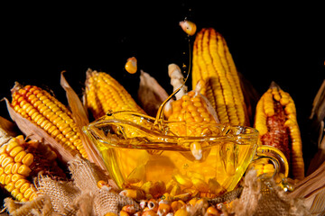 splash of fresh corn, with background of ears of corn