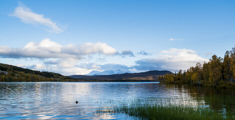 Clouds over a snowy Mountain in Norway  