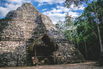 Old stone pyramid ruins at the Mayan archeological site at Coba, Mexico