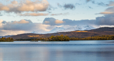 Clouds over a snowy Mountain in Norway  