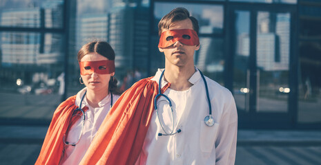 close up. doctors are superheroes standing on a city street .