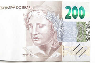 Close up at the two hundred real banknote from Brazil. Brazilian 200 reais brl. Front, real note isolated on white.