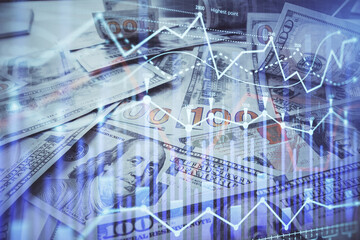 Multi exposure of forex chart drawing over us dollars bill background. Concept of financial success markets.