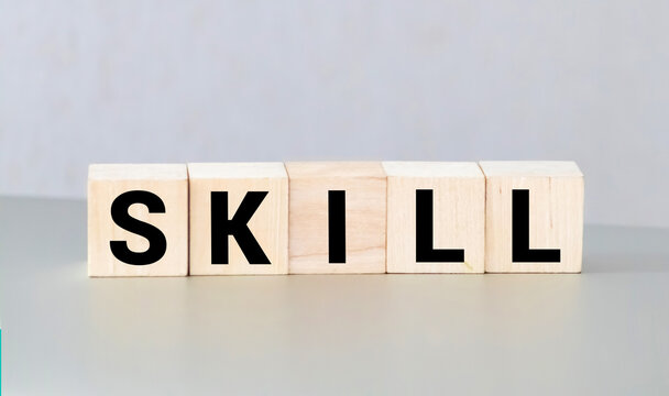 Skill word on wooden cubes.