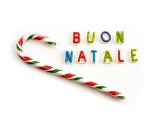 Buon Natale in Italian for Merry Christmas spelled in candy letters isolated on white