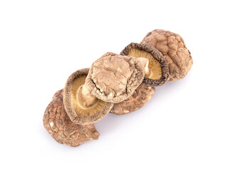 A pile of dried mushrooms on white background