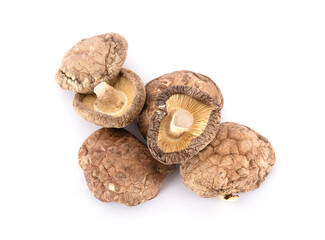 A pile of dried mushrooms on white background