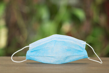 A disposable mask on the table