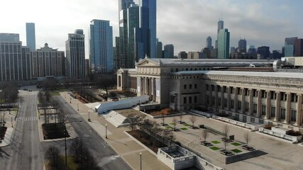 Chicago USA, Static Drone Aerial View of Field Museum and Downtown Skyscrapers. Closed Building and Empty Parking During Corona Virus Pandemic Outbreak Lockdown and Quarantine