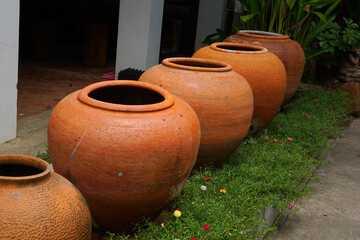 Water storage containers made from soil