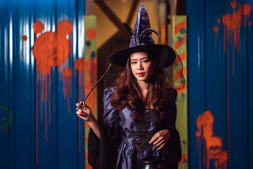 beautiful young woman in witches halloween costumes on party