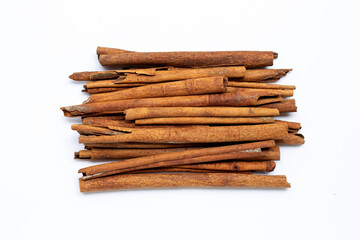 Cinnamon sticks on white background.