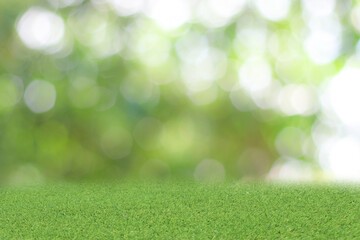Natural green background It is a lawn with a blurred green background. Bokeh can be used as a background.