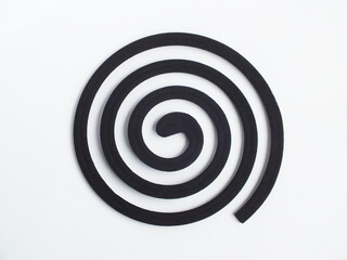 Mosquito repellent coil on white background.