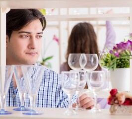 The young family shopping in shop