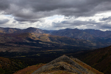 View of Scenic Landscape and Mountains during Fall in Canadian Nature. Aerial Shot. Taken in Tombstone Territorial Park, Yukon, Canada.